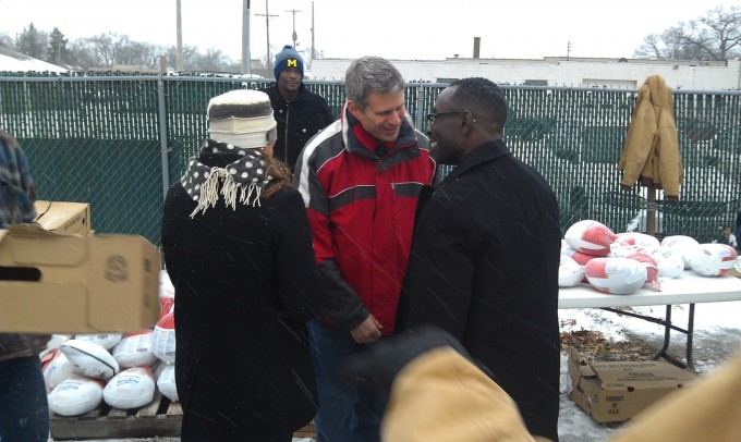 Congressman Bill Huizenga and the Honorable Gregory C. Pittman at the 2013 turkey giveaway.